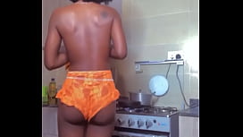 Naughty babe cooking